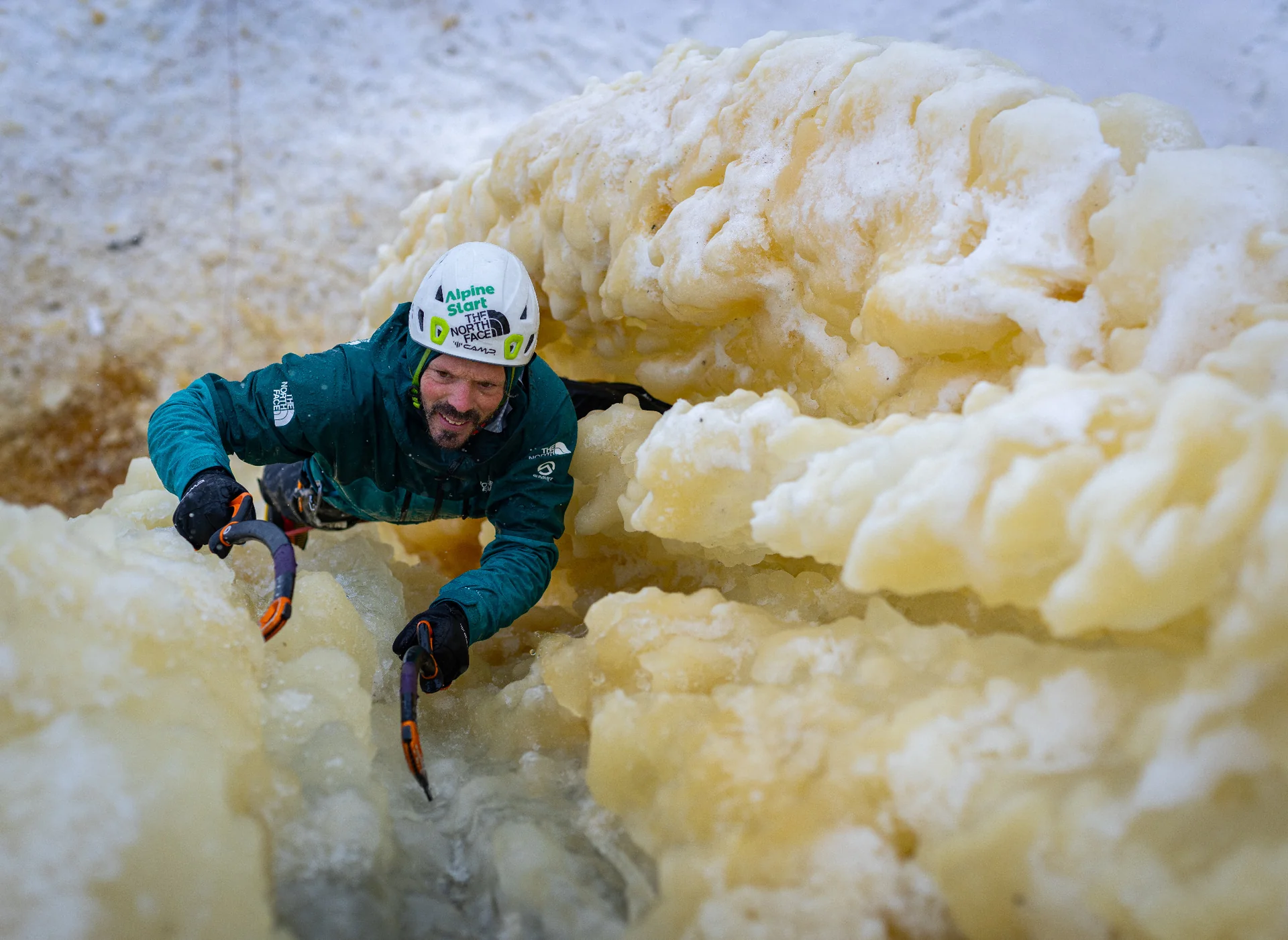Matt Segal climbing through sculpted ice on Resurrection.